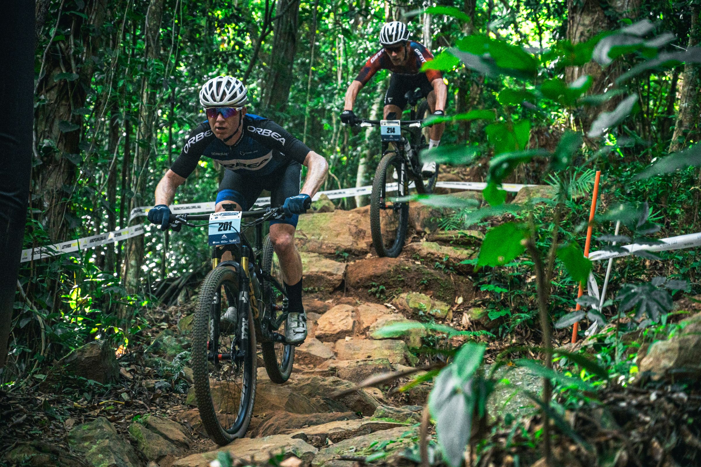 Two cross-country XCO racers at the UCI Masters MTB World Championships in Cairns, 2025